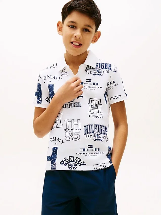 Kids’ Allover Logo Stretch Polo Kids’ Allover Logo Stretch Polo