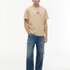 Tommy Jeans Multi-Crest Logo T-Shirt Tommy Jeans Multi-Crest Logo T-Shirt