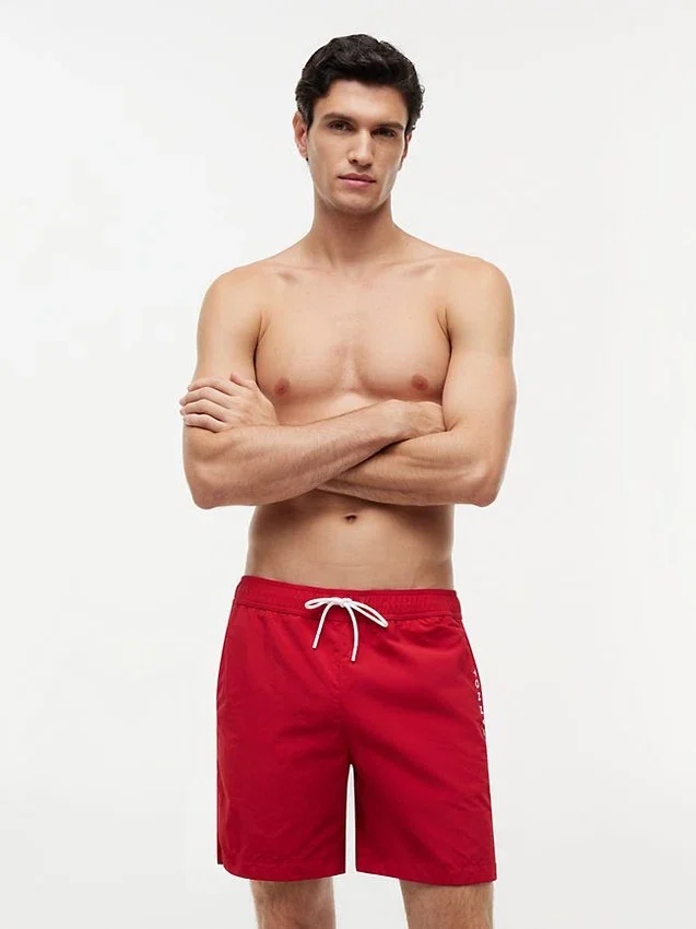 Tommy Logo 7″ Swim Trunk Tommy Logo 7″ Swim Trunk