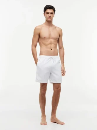 Tommy Logo 7″ Swim Trunk Tommy Logo 7″ Swim Trunk