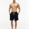 Tommy Logo 7″ Swim Trunk Tommy Logo 7″ Swim Trunk