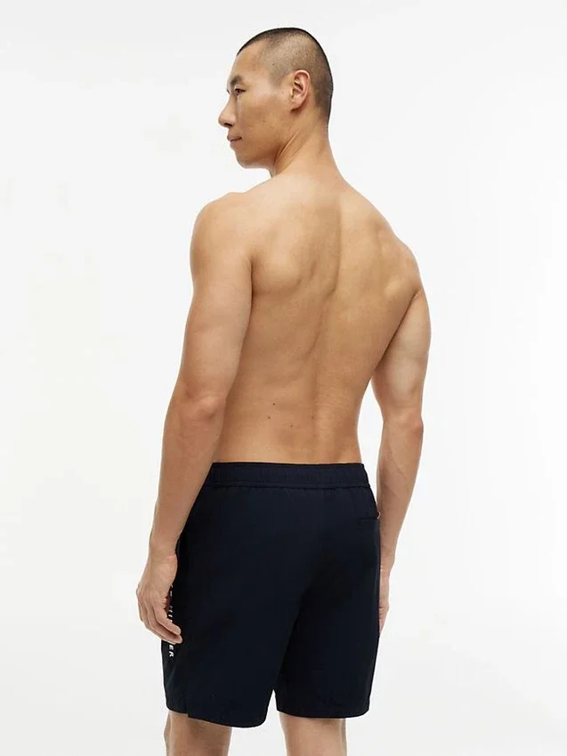 Tommy Logo 7″ Swim Trunk Tommy Logo 7″ Swim Trunk